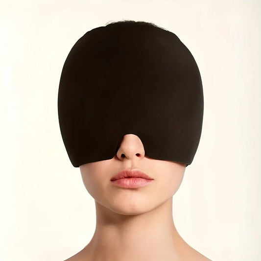 Black headache, stress, pain relief mask covering eyes on a plain background