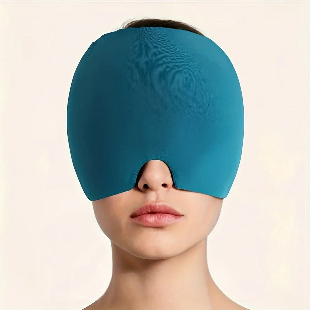 Blue headache, stress, pain relief mask covering eyes on a plain background